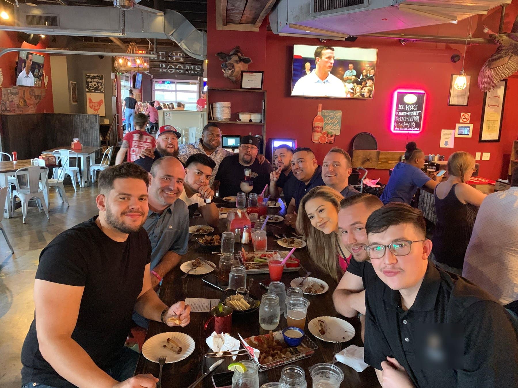 Gavin Brooks with a retail team at a team dinner